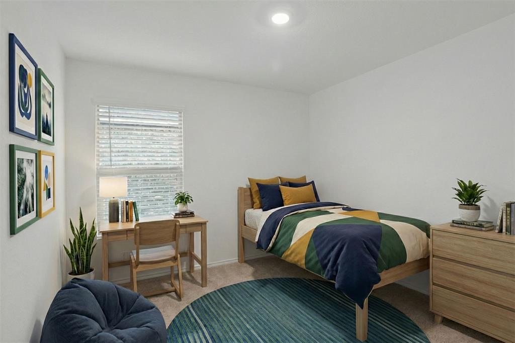 14048 Earlham Street Pilot Point, TX 76258 - Photo 10 of 15 a bed room with a bed and a chair