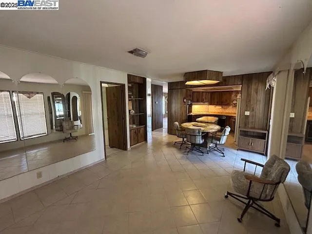 a view of a room with a balcony and window