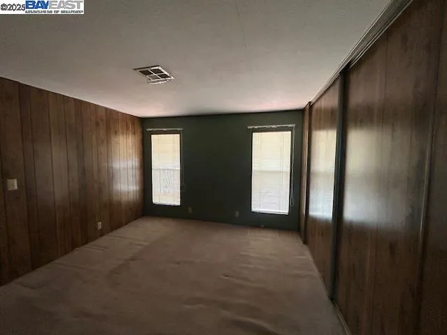 a bathroom with a bathtub sink and mirror