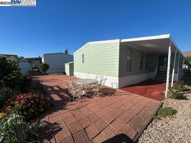 a balcony with view of nearby houses