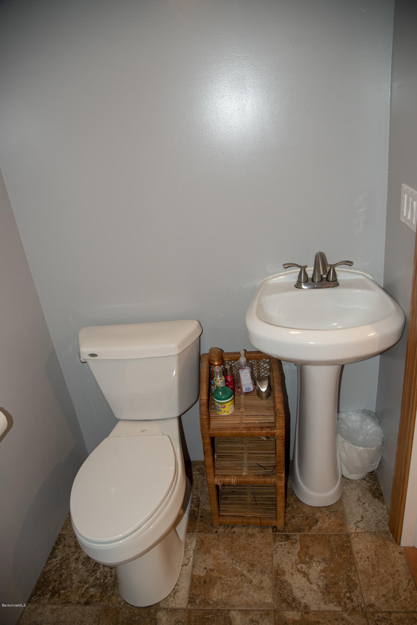 97 North Summer Street Adams, MA 01220 - Photo 15 of 17 a bathroom with a toilet sink and mirror