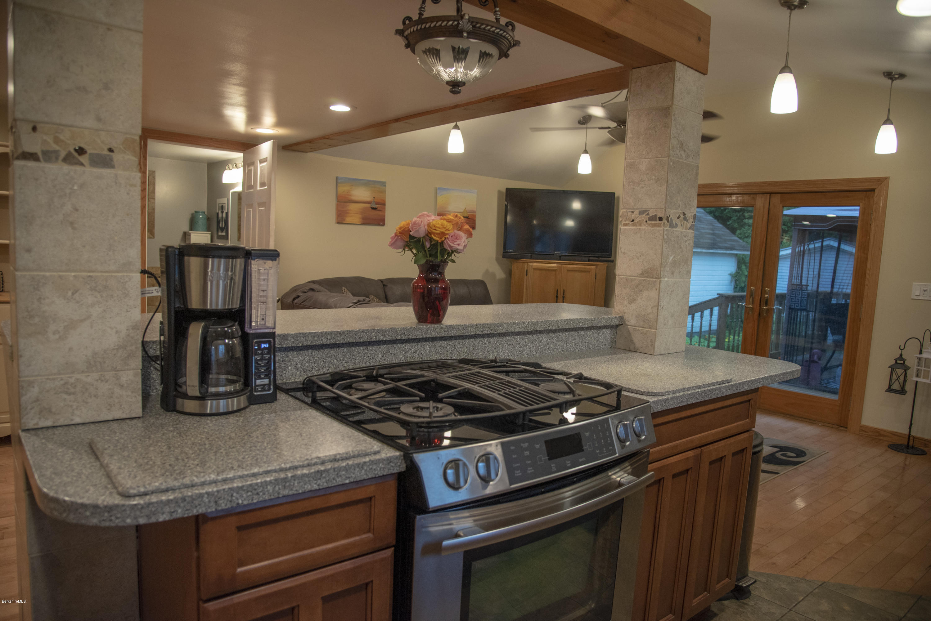 97 North Summer Street Adams, MA 01220 - Photo 3 of 17 a kitchen with a stove and a refrigerator
