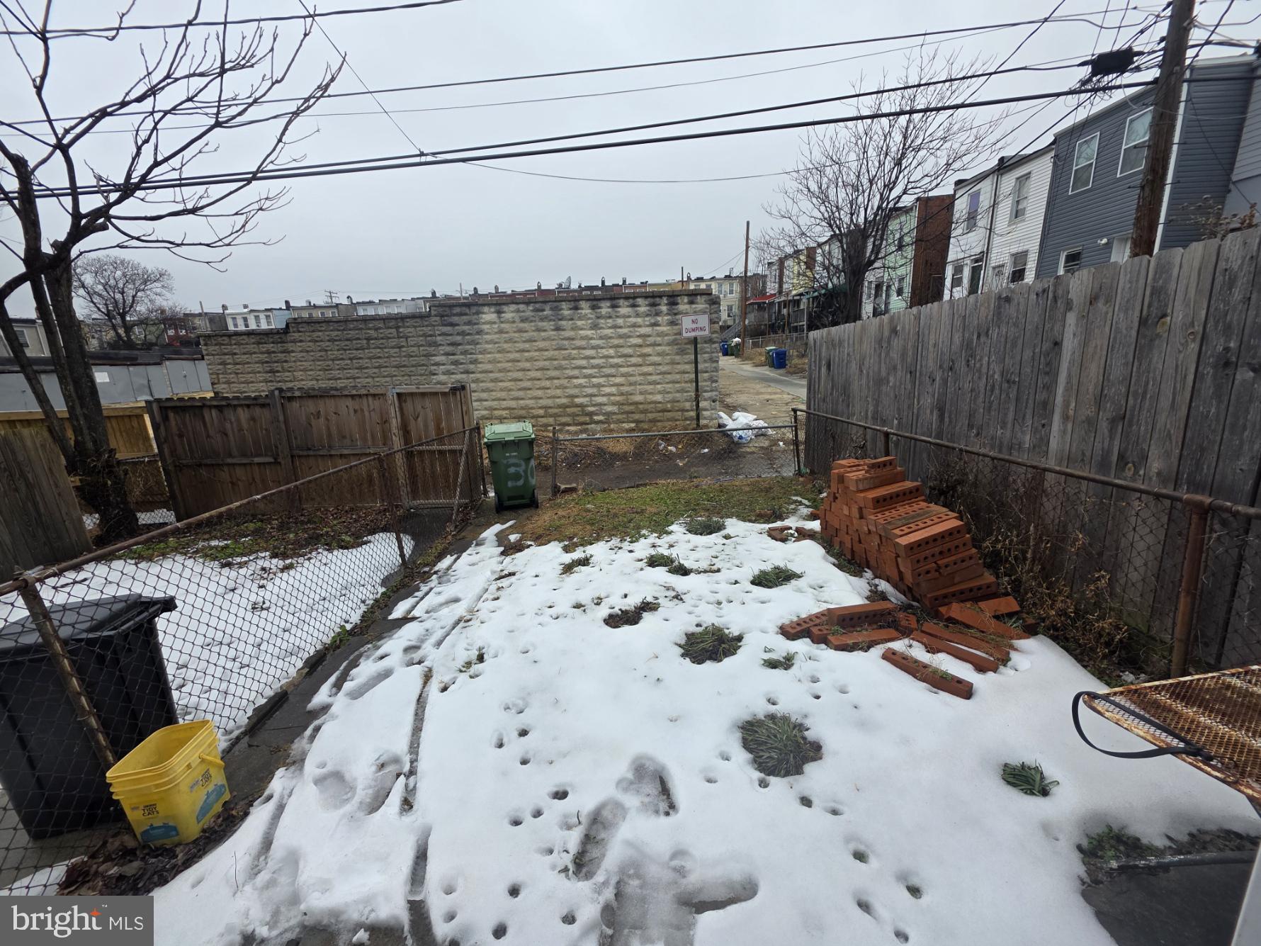 2730 East Chase Street Baltimore, MD 21213 - Photo 17 of 17 a view of roof with wooden floor