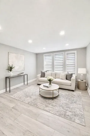 a living room with furniture and a couch