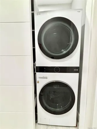 a utility room with dryer and washer