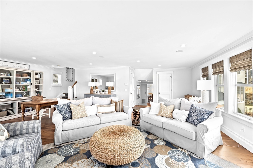 170 Otis Street Hingham, MA 02043 - Photo 16 of 42 a living room with furniture and a large window