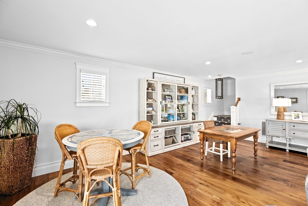 170 Otis Street Hingham, MA 02043 - Photo 19 of 42 a dining room with furniture and wooden floor