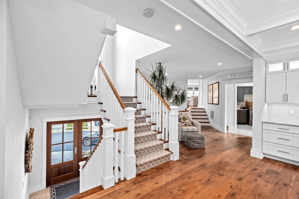 170 Otis Street Hingham, MA 02043 - Photo 20 of 42 workspace with wooden floor and stairs