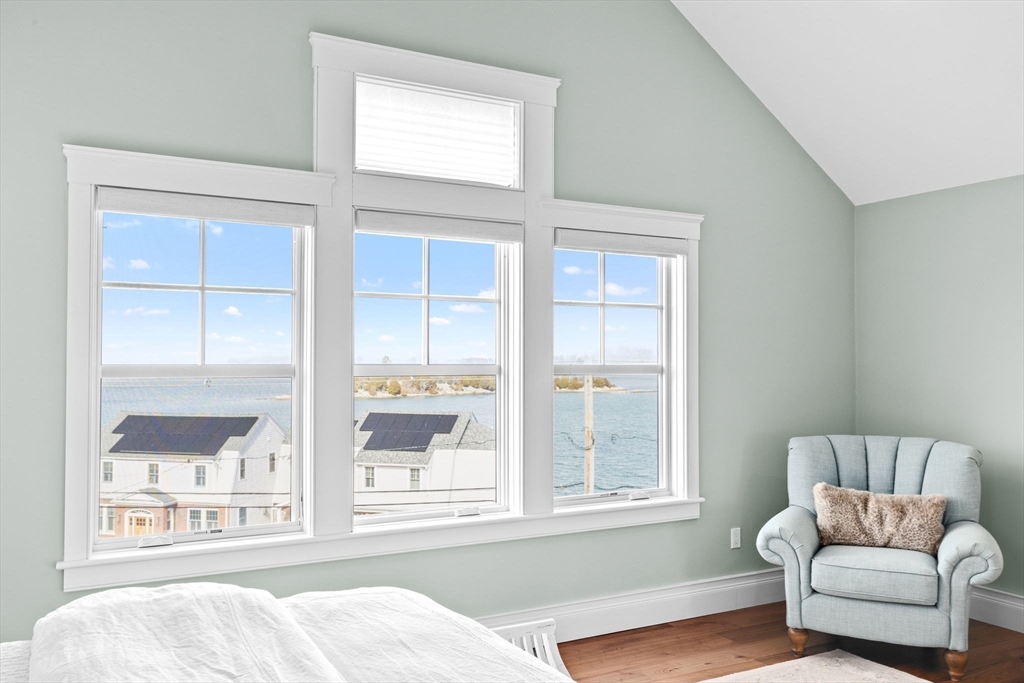 170 Otis Street Hingham, MA 02043 - Photo 22 of 42 a living room with furniture and windows