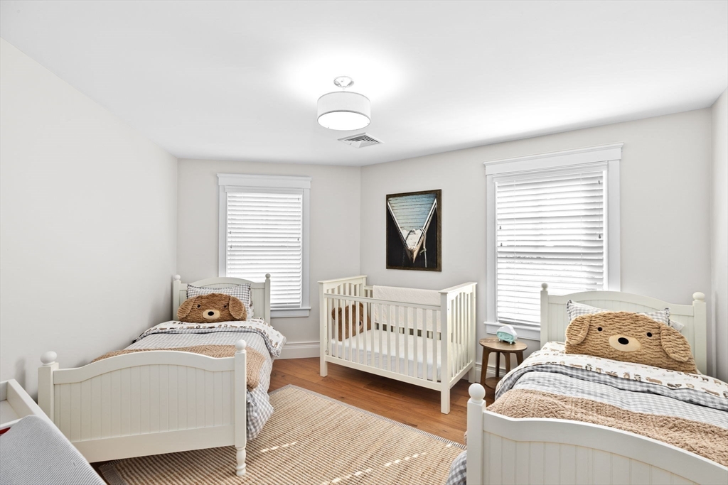 170 Otis Street Hingham, MA 02043 - Photo 26 of 42 a bedroom with a bed and a window