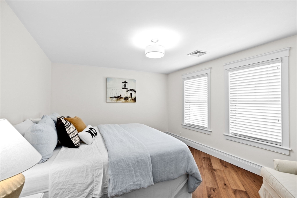 170 Otis Street Hingham, MA 02043 - Photo 27 of 42 a bedroom with a bed and a window