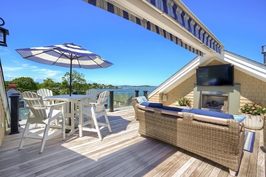 170 Otis Street Hingham, MA 02043 - Photo 35 of 42 a view of a chairs and table in the terrace