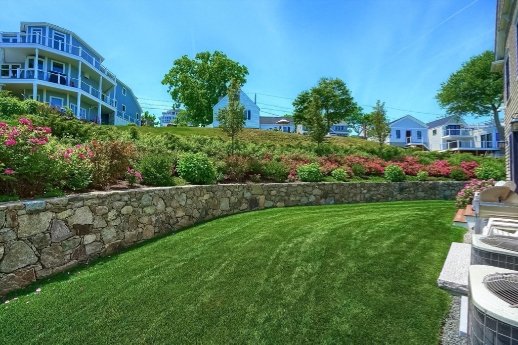 170 Otis Street Hingham, MA 02043 - Photo 39 of 42 a view of an apartment with a garden and plants