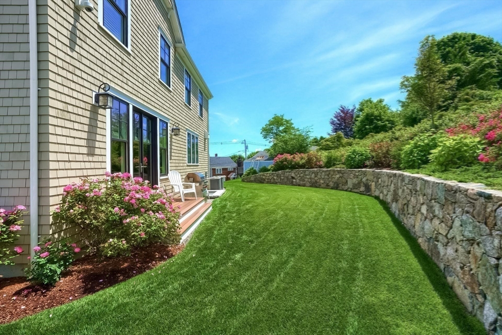 170 Otis Street Hingham, MA 02043 - Photo 42 of 42 a front view of a house with a yard