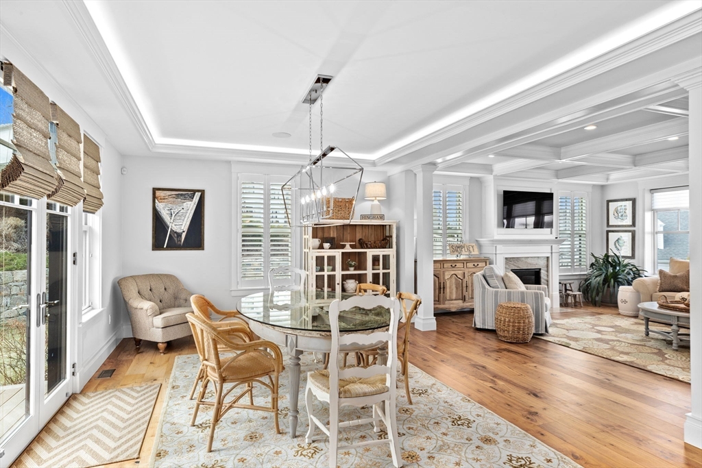 170 Otis Street Hingham, MA 02043 - Photo 6 of 42 a view of a dining room with furniture window and wooden floor