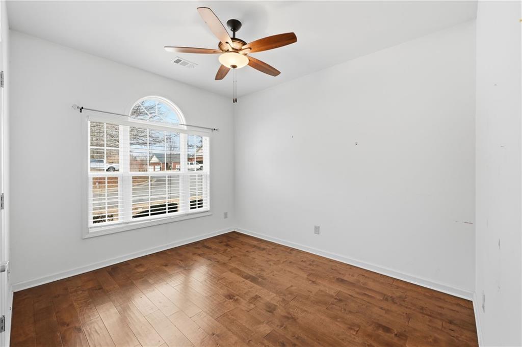 166 Senior Circle Northeast Gainesville, GA 30501 - Photo 22 of 32 an empty room with windows