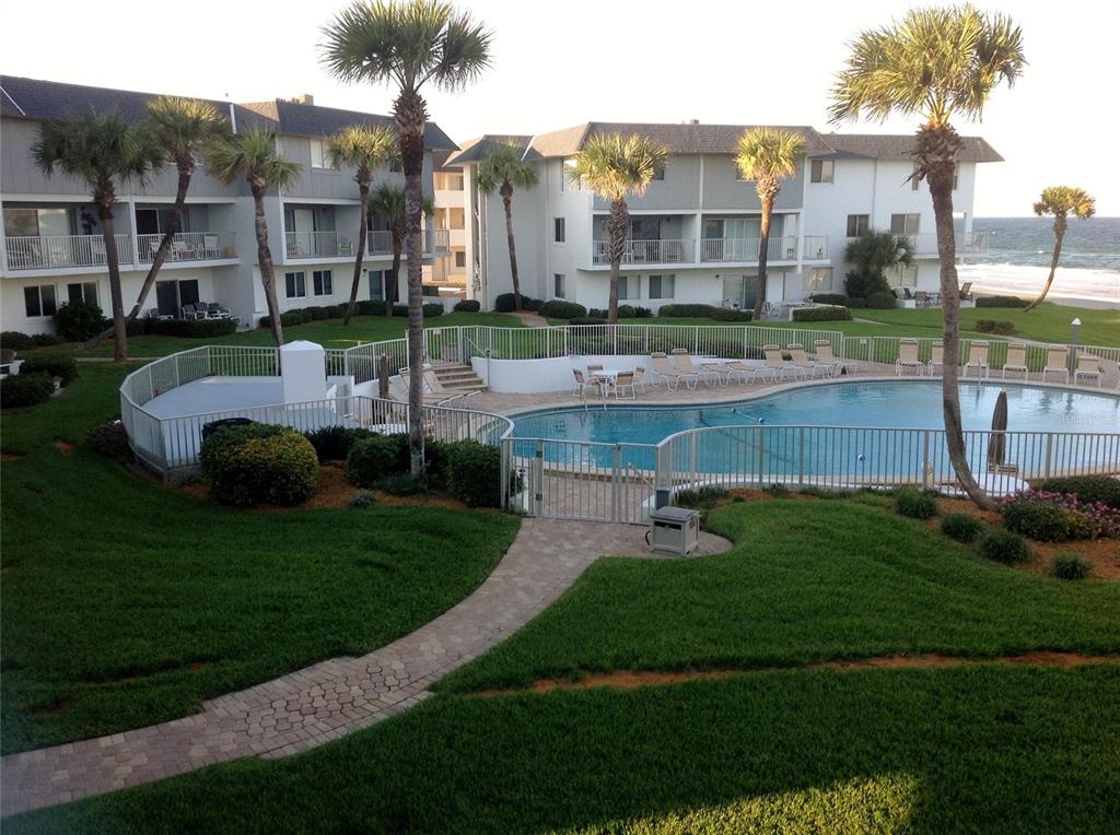 815 Ocean Shore Boulevard, Unit 5A Ormond Beach, FL 32176 - Photo 1 of 1 a garden view with a outdoor space