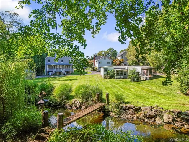 a view of a garden with houses