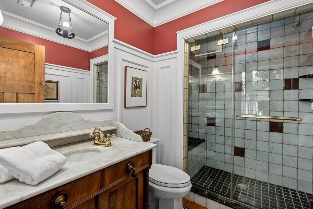 165 Fair Oaks Park Needham, MA 02492 - Photo 13 of 28 a bathroom with a sink toilet vanity and shower