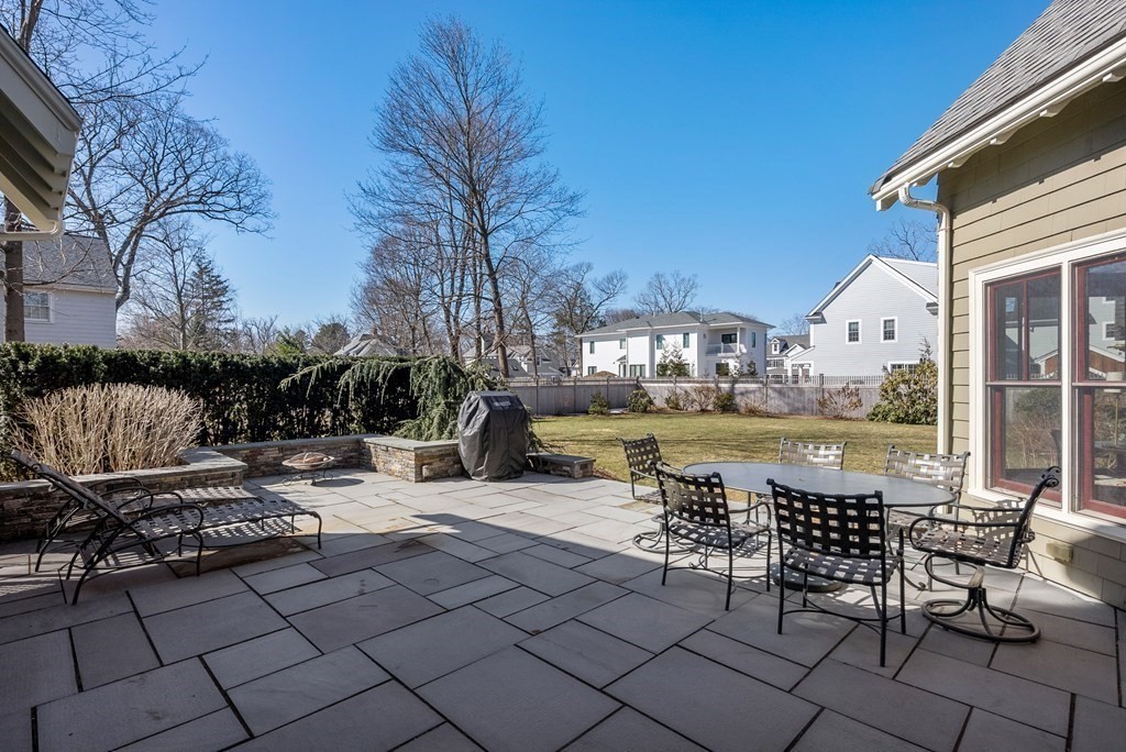 165 Fair Oaks Park Needham, MA 02492 - Photo 22 of 28 a view of a swimming pool and lounge chairs