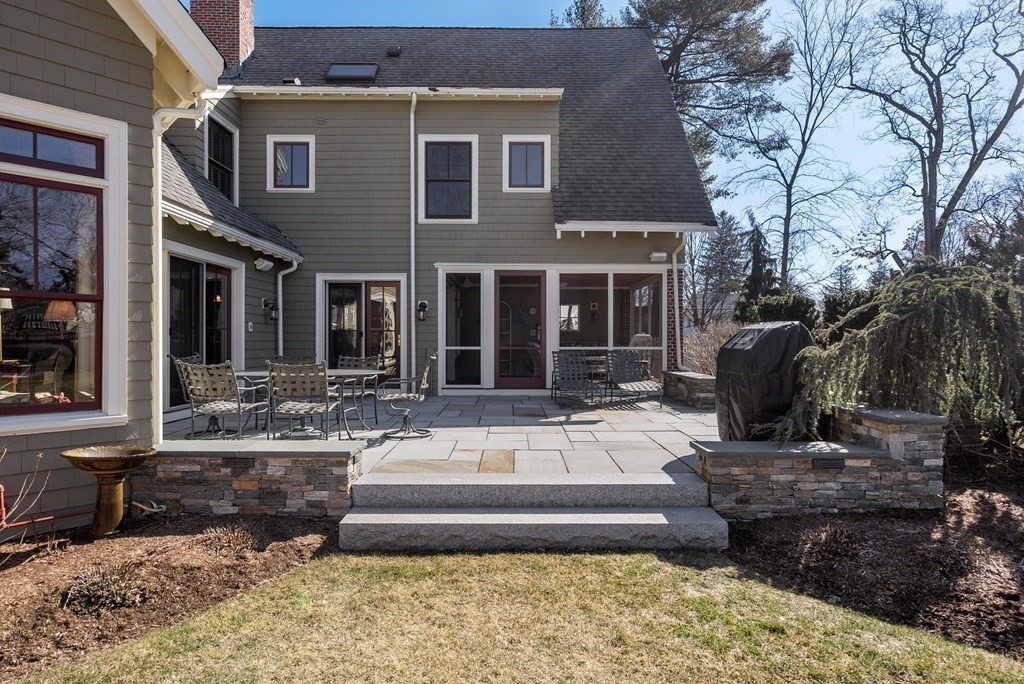 165 Fair Oaks Park Needham, MA 02492 - Photo 23 of 28 a view of a house with backyard and sitting area