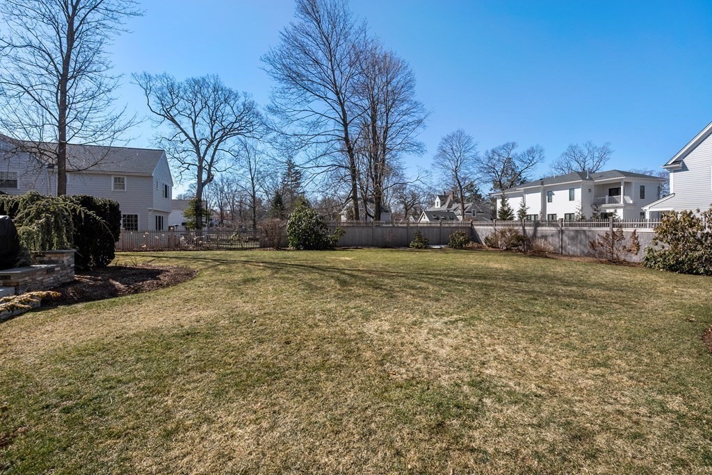 165 Fair Oaks Park Needham, MA 02492 - Photo 24 of 28 a view of a yard with a table and chairs