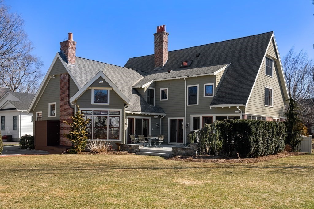 165 Fair Oaks Park Needham, MA 02492 - Photo 27 of 28 a front view of a house with a porch