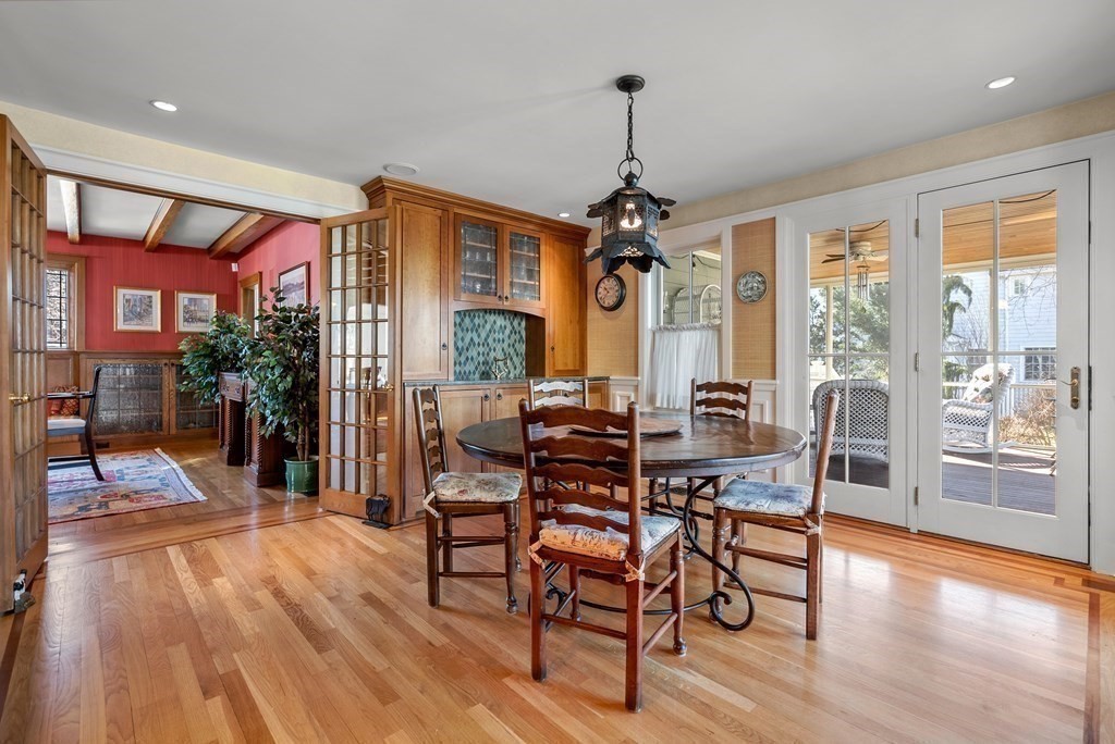 165 Fair Oaks Park Needham, MA 02492 - Photo 10 of 28 a view of a dining room with furniture window and wooden floor