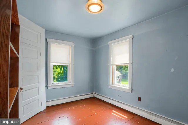 an empty room with window