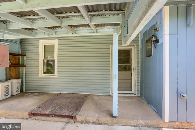 a view of a house with a yard and garage