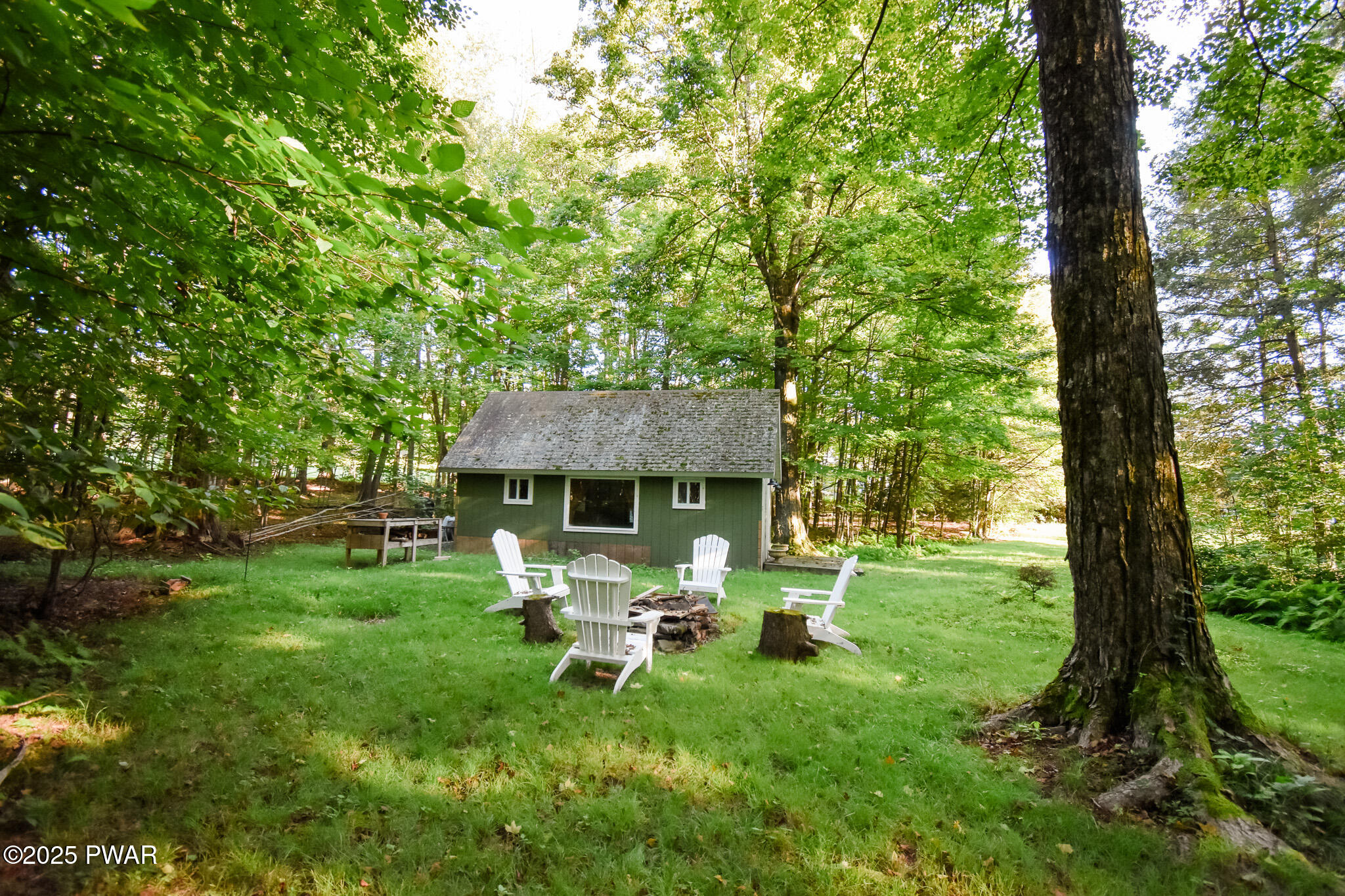 66 Wash Road Waymart, PA 18472 - Photo 37 of 41 a view of a chair and table in backyard of the house