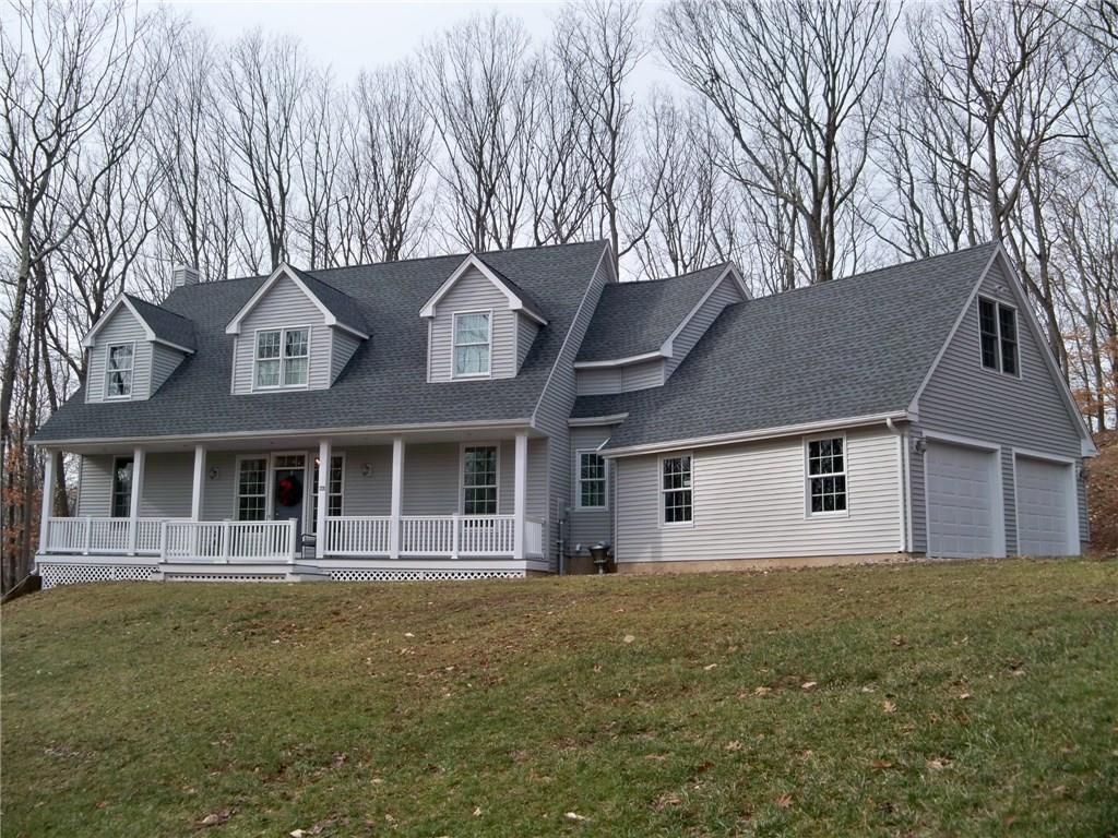 1378 Scard Road Wallingford, CT 06492 - Photo 1 of 1 a front view of a house with a garden