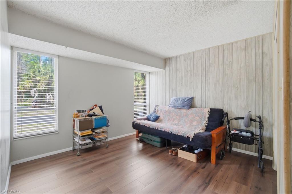 3670 27th Avenue Southwest Naples, FL 34117 - Photo 22 of 38 a bedroom with furniture and a window