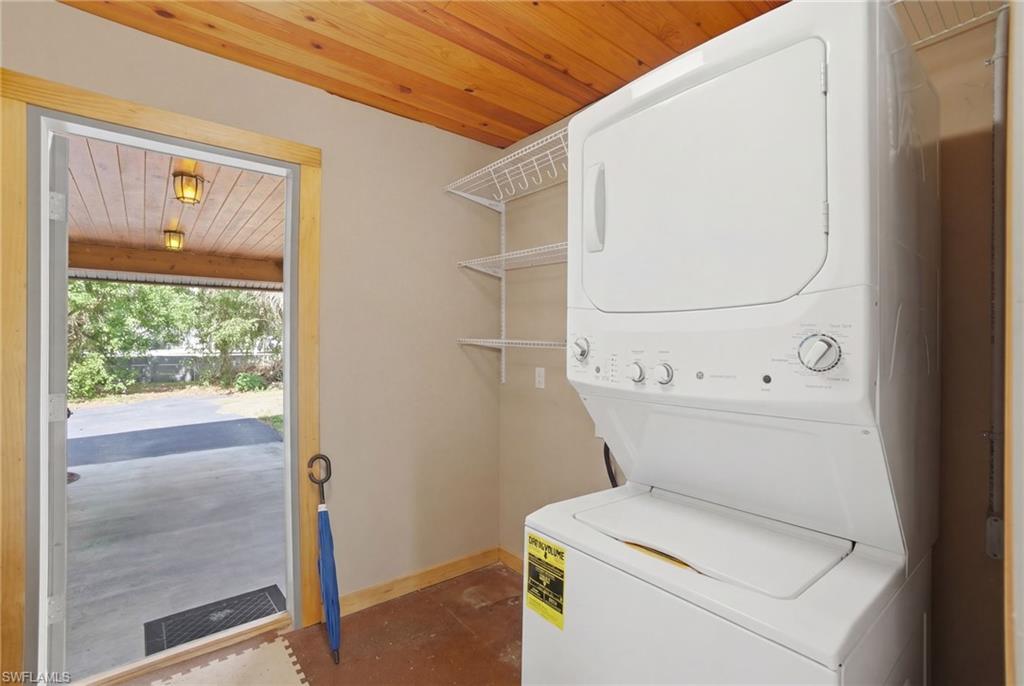 3670 27th Avenue Southwest Naples, FL 34117 - Photo 35 of 38 a view of bathroom with a washer and dryer