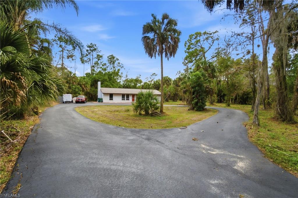3670 27th Avenue Southwest Naples, FL 34117 - Photo 6 of 38 a view of a house with swimming pool