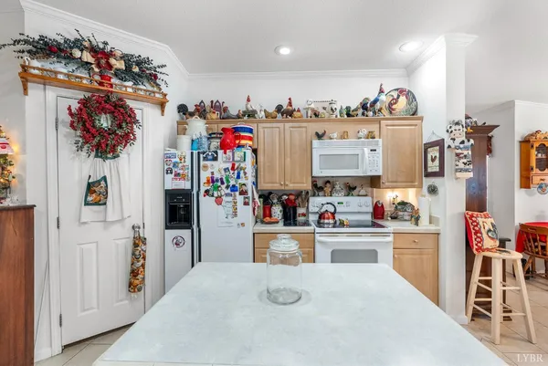 a view of a kitchen with appliances and cabinets