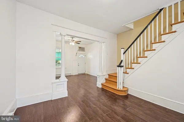 a view of entryway with wooden floor