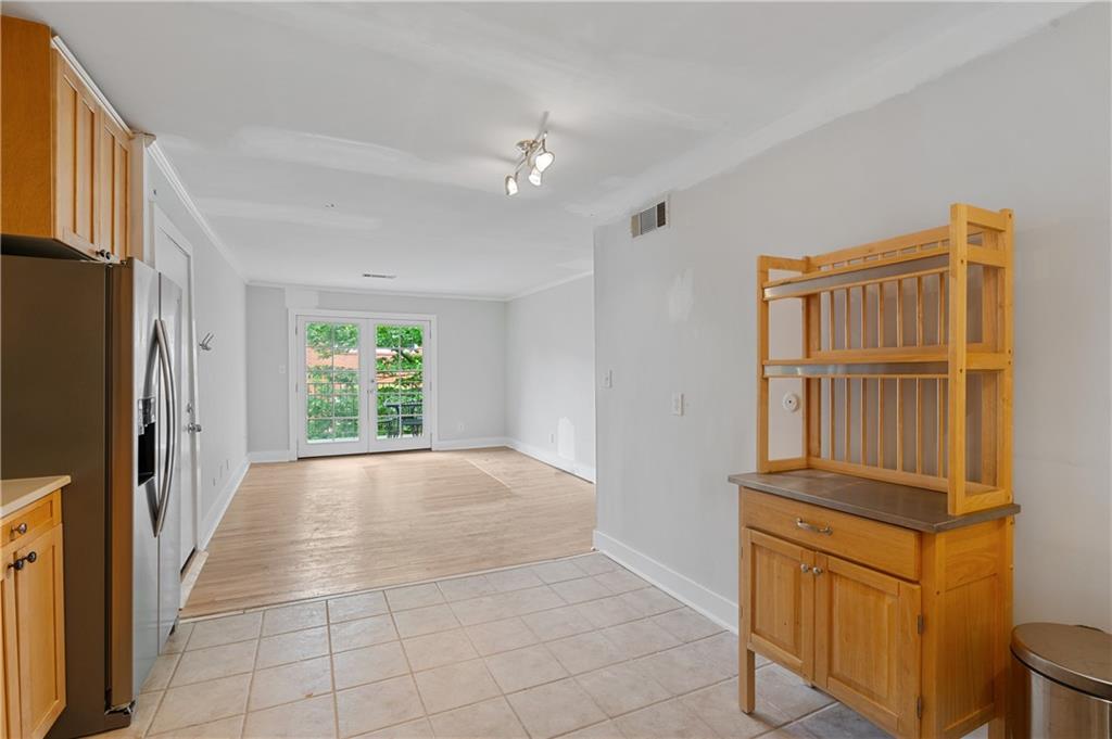 866 Briarcliff Road Northeast, Unit B3 Atlanta, GA 30306 - Photo 8 of 17 a view of a hallway with windows