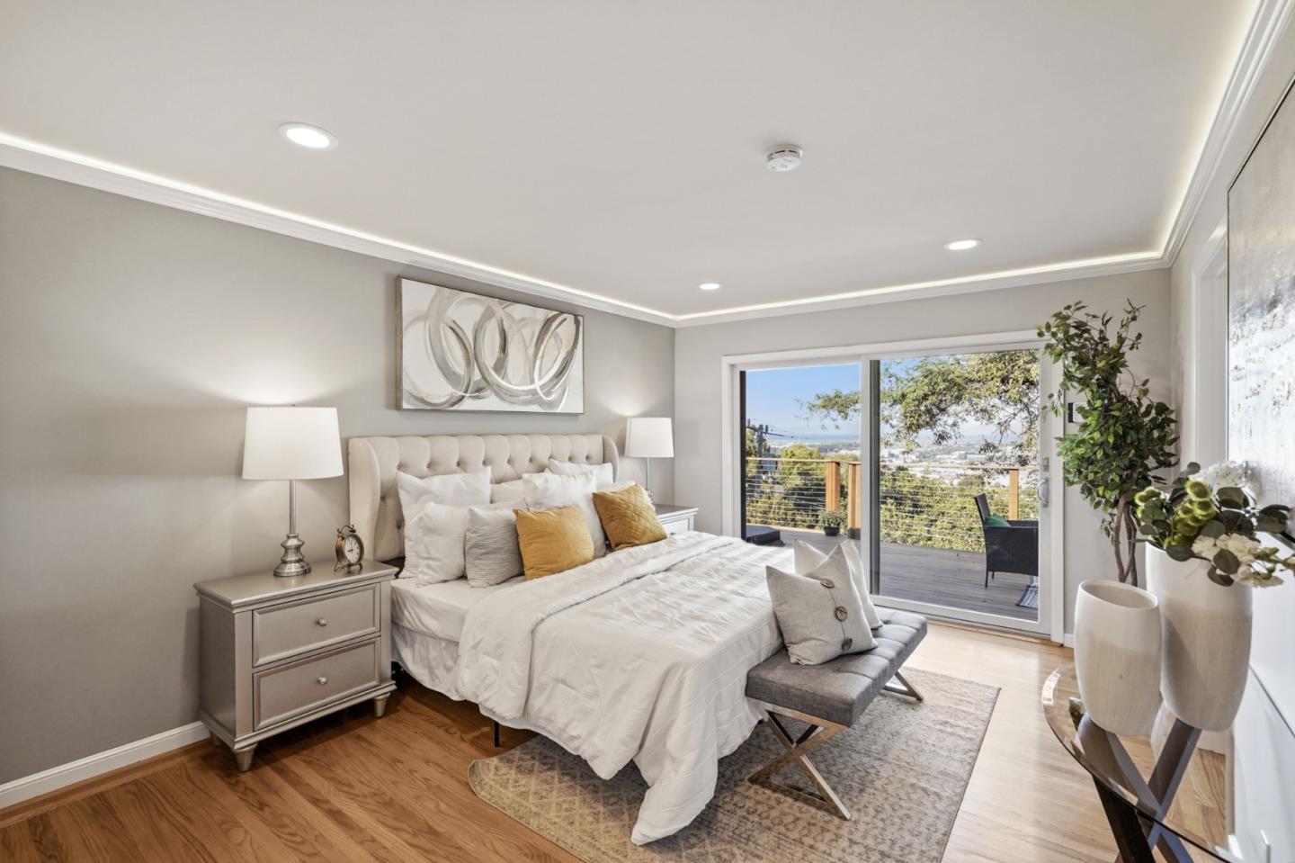 22 Del Rey Court San Carlos, CA 94070 - Photo 15 of 47 a bedroom with a large bed and a large window