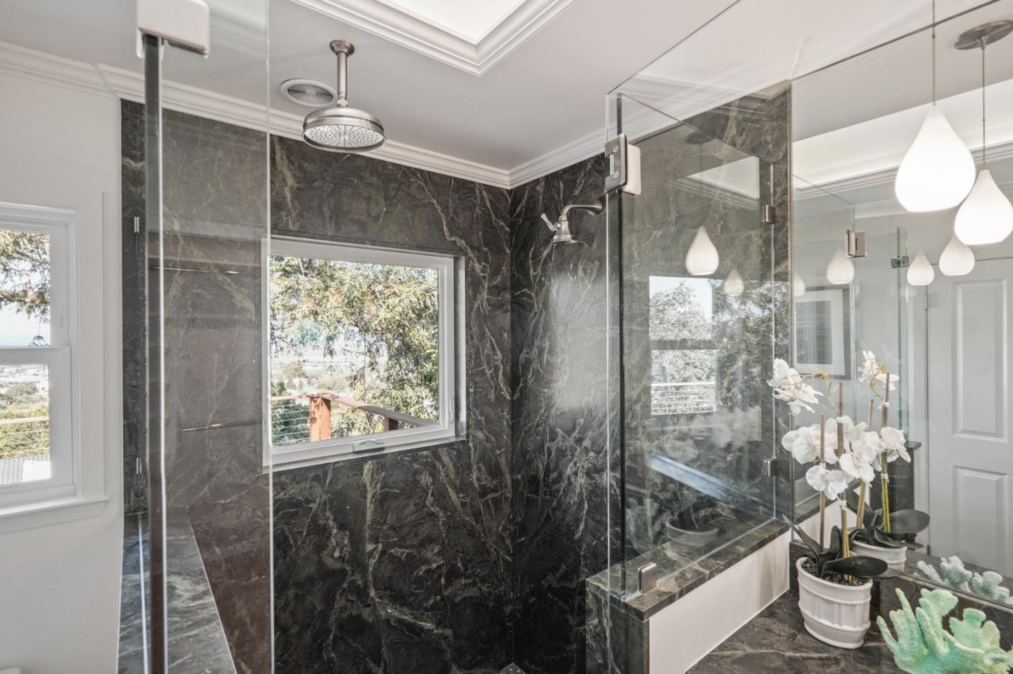 22 Del Rey Court San Carlos, CA 94070 - Photo 20 of 47 a bathroom with a granite countertop sink a toilet and shower