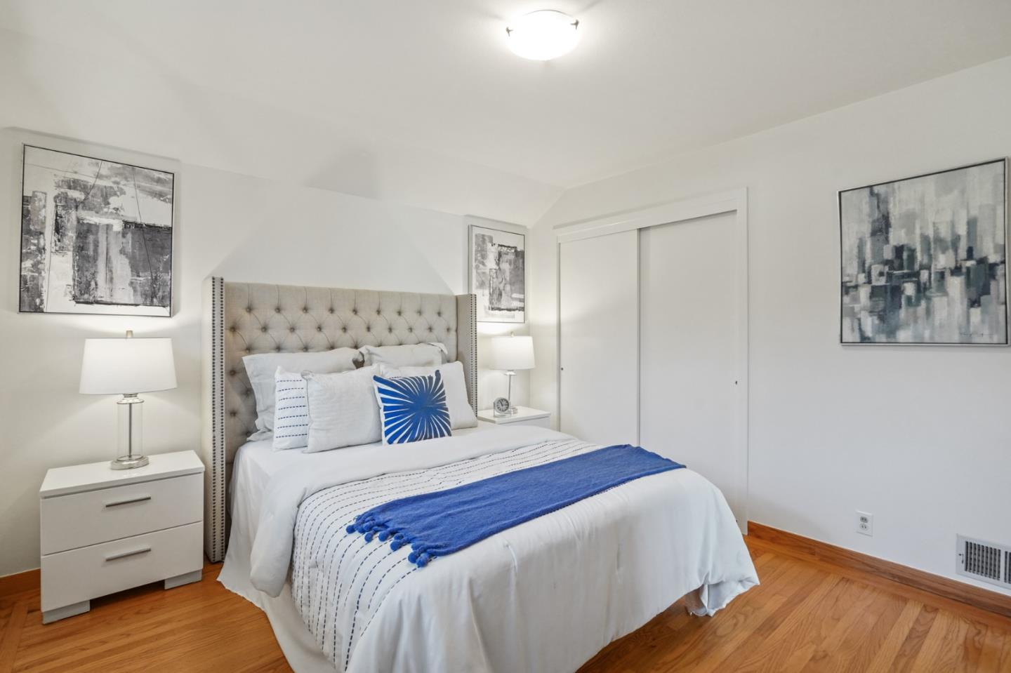 22 Del Rey Court San Carlos, CA 94070 - Photo 23 of 47 a bedroom with a bed and a night stand