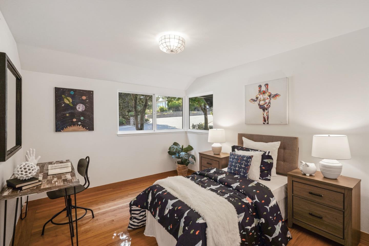 22 Del Rey Court San Carlos, CA 94070 - Photo 24 of 47 a bed room with a bed tv and a window