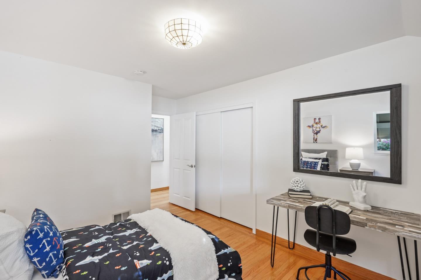 22 Del Rey Court San Carlos, CA 94070 - Photo 26 of 47 a bedroom with a bed and a painting on the wall