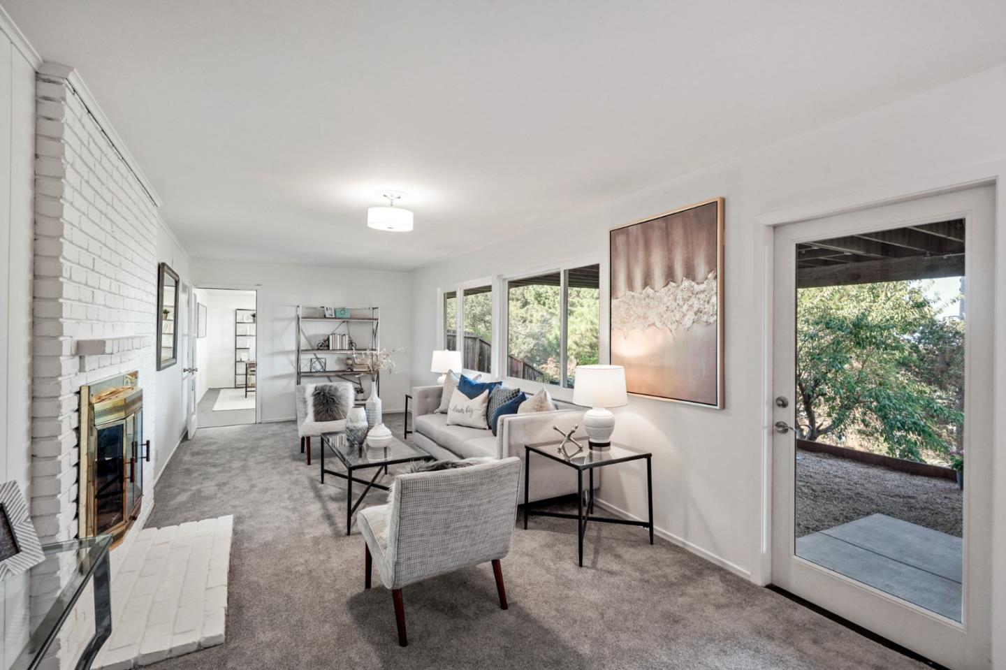 22 Del Rey Court San Carlos, CA 94070 - Photo 29 of 47 a living room with furniture fireplace and a window