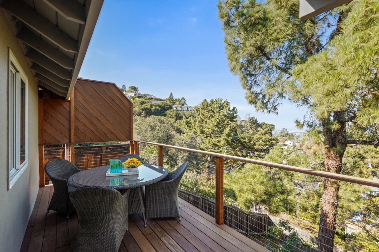 22 Del Rey Court San Carlos, CA 94070 - Photo 41 of 47 a balcony with table and chairs