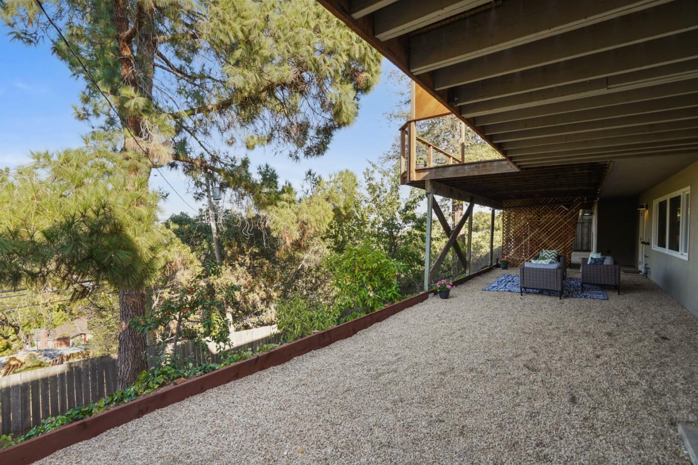 22 Del Rey Court San Carlos, CA 94070 - Photo 43 of 47 a view of a porch with furniture and a yard