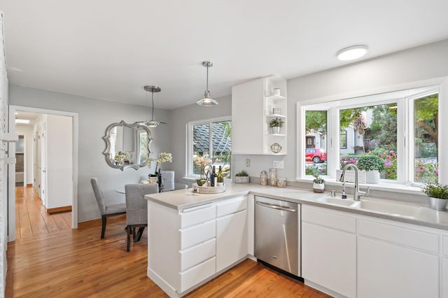 a kitchen with sink and window