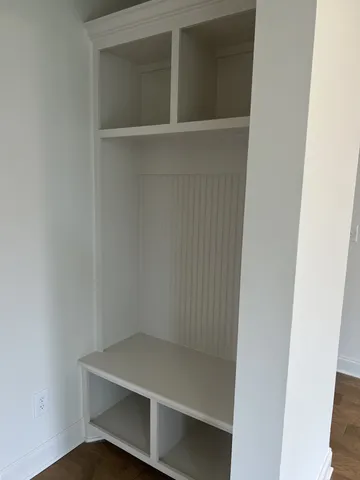 a view of an empty walk in closet