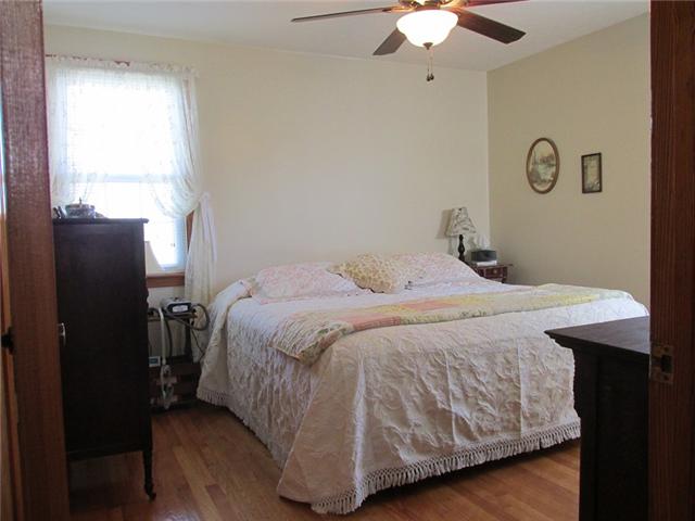 5385 Awalt Road Tullahoma, TN 37388 - Photo 6 of 20 Master bedroom with hardwood floors and full bath
