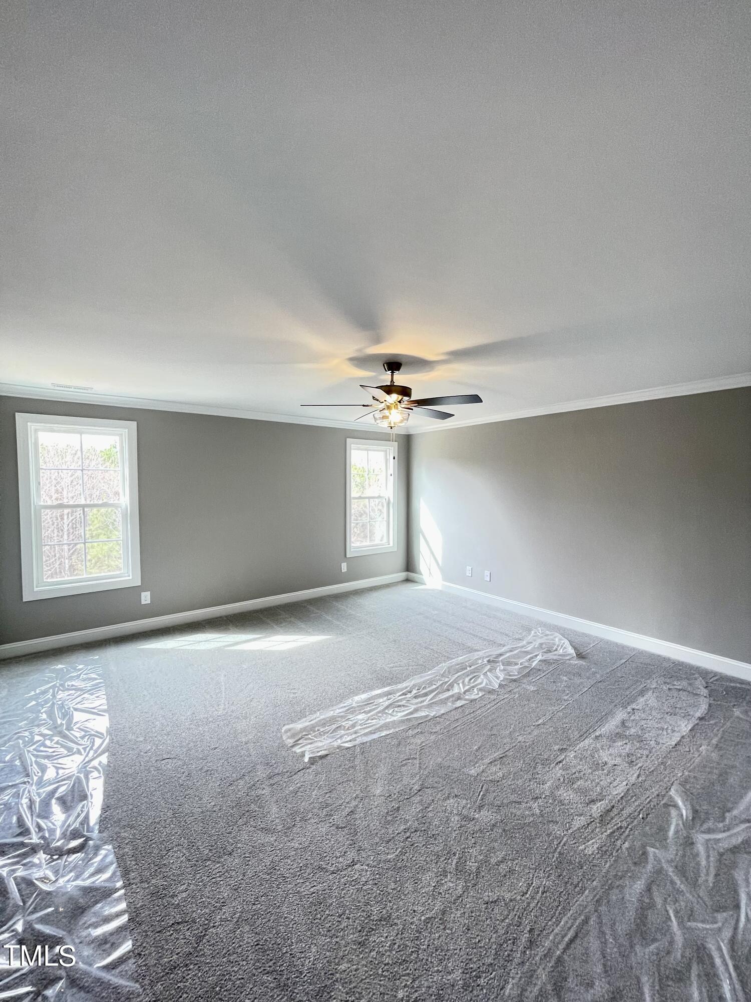 35 Sunrise Court Spring Hope, NC 27882 - Photo 12 of 18 a view of empty room with window and ceiling fan